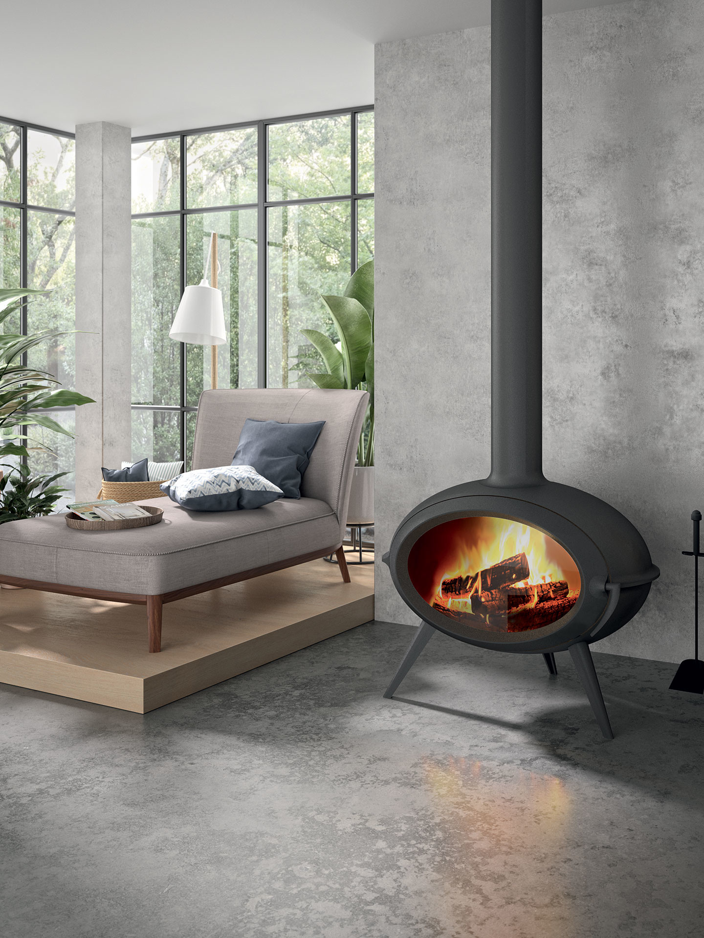 Salon moderne avec poêle, chaise longue, plantes.